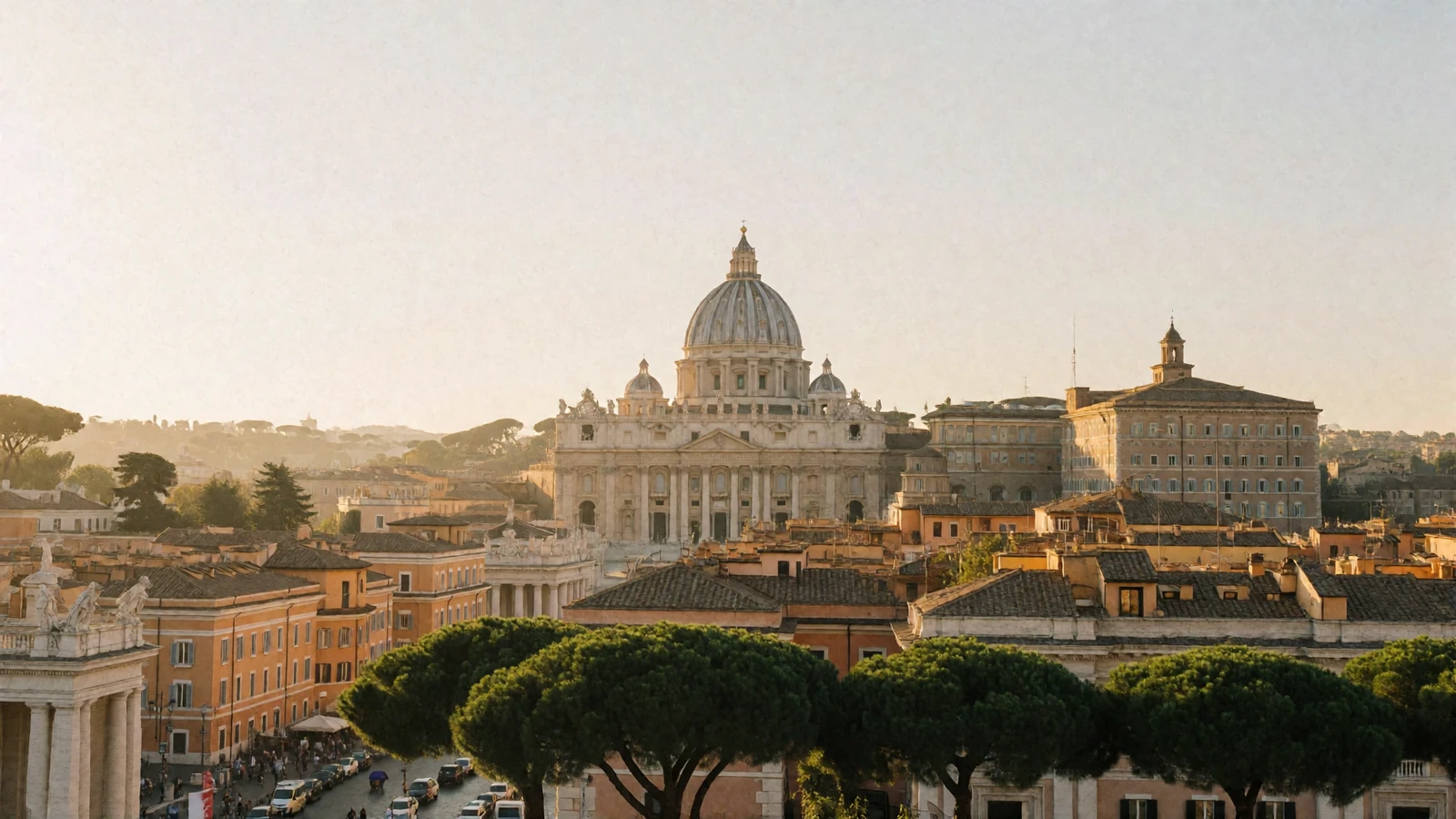 Golden-hour view across Rome toward the dome and colonnade of Vatican City above ochre rooftops